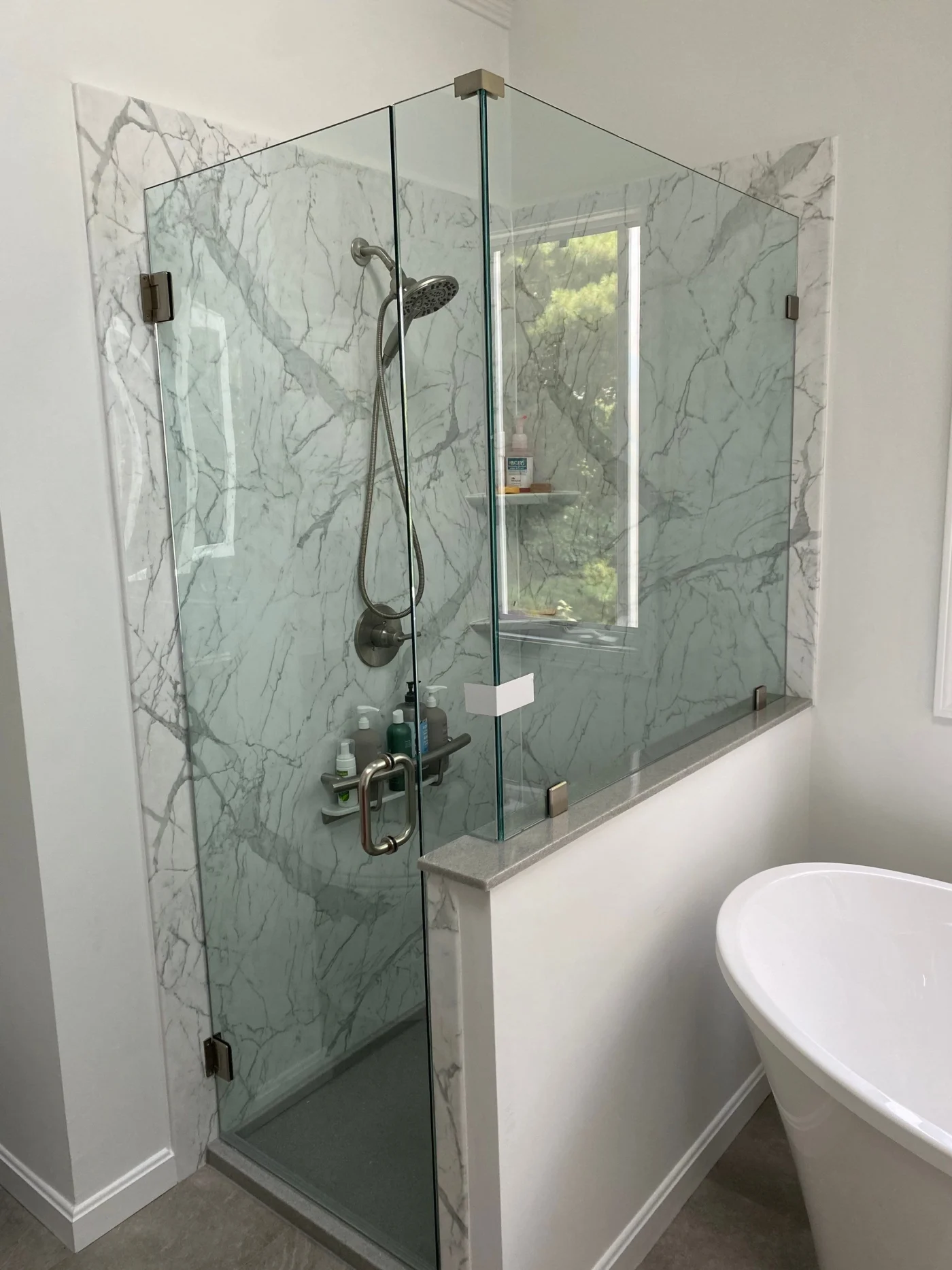 A full bathroom remodel that included adding a full glass shower to the bathroom space. With full glass doors and walls, the result was a stunning remodel.