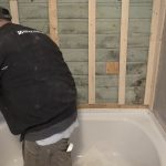 Master plumber from Bay State Bath works on bath remodel faucet in greater boston